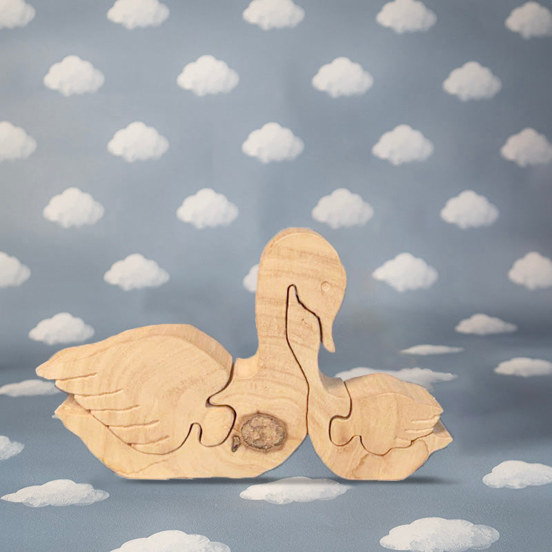 Statuina in legno "Cigni"