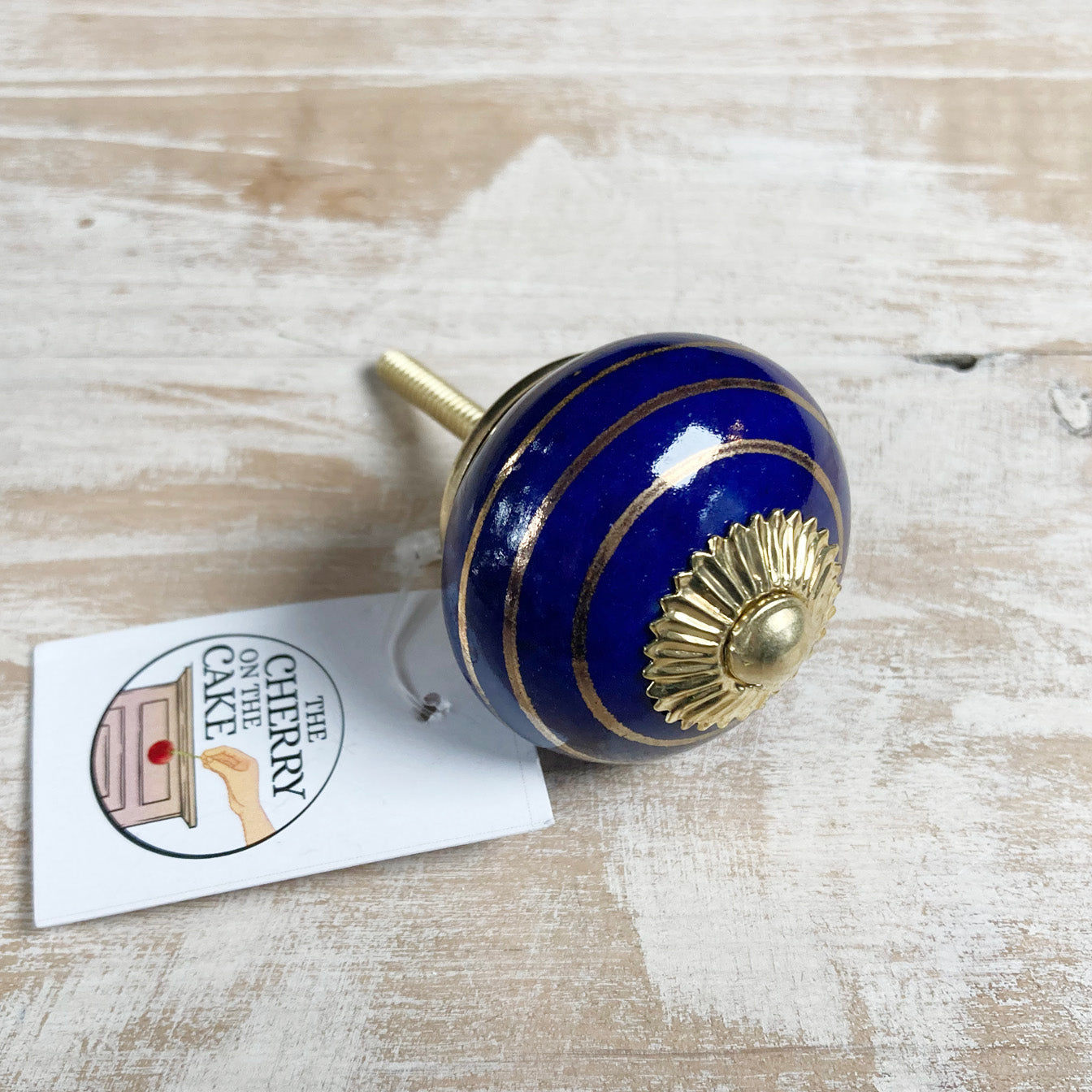 Pomello in ceramica “Cerchi nel blu”